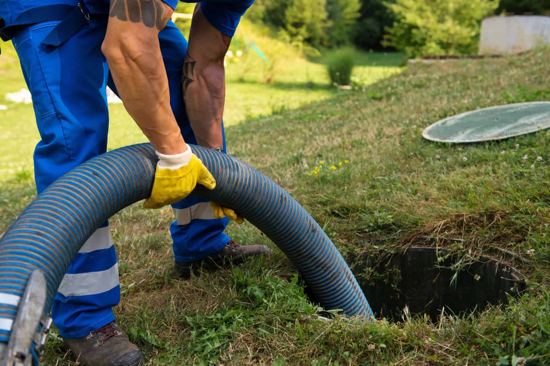 Universal Drain Cleaners cleaning out septic system at older home